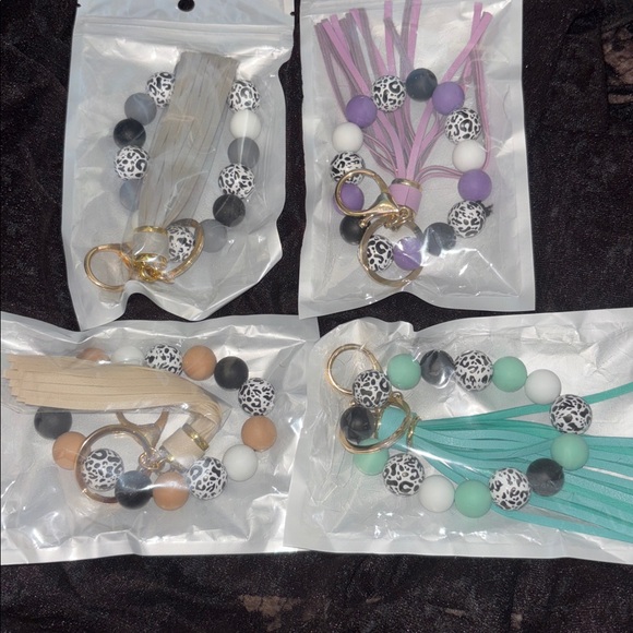 Jewelry - SET of 4 Leopard Print Beaded Bracelets with Tassel Keychain NEW